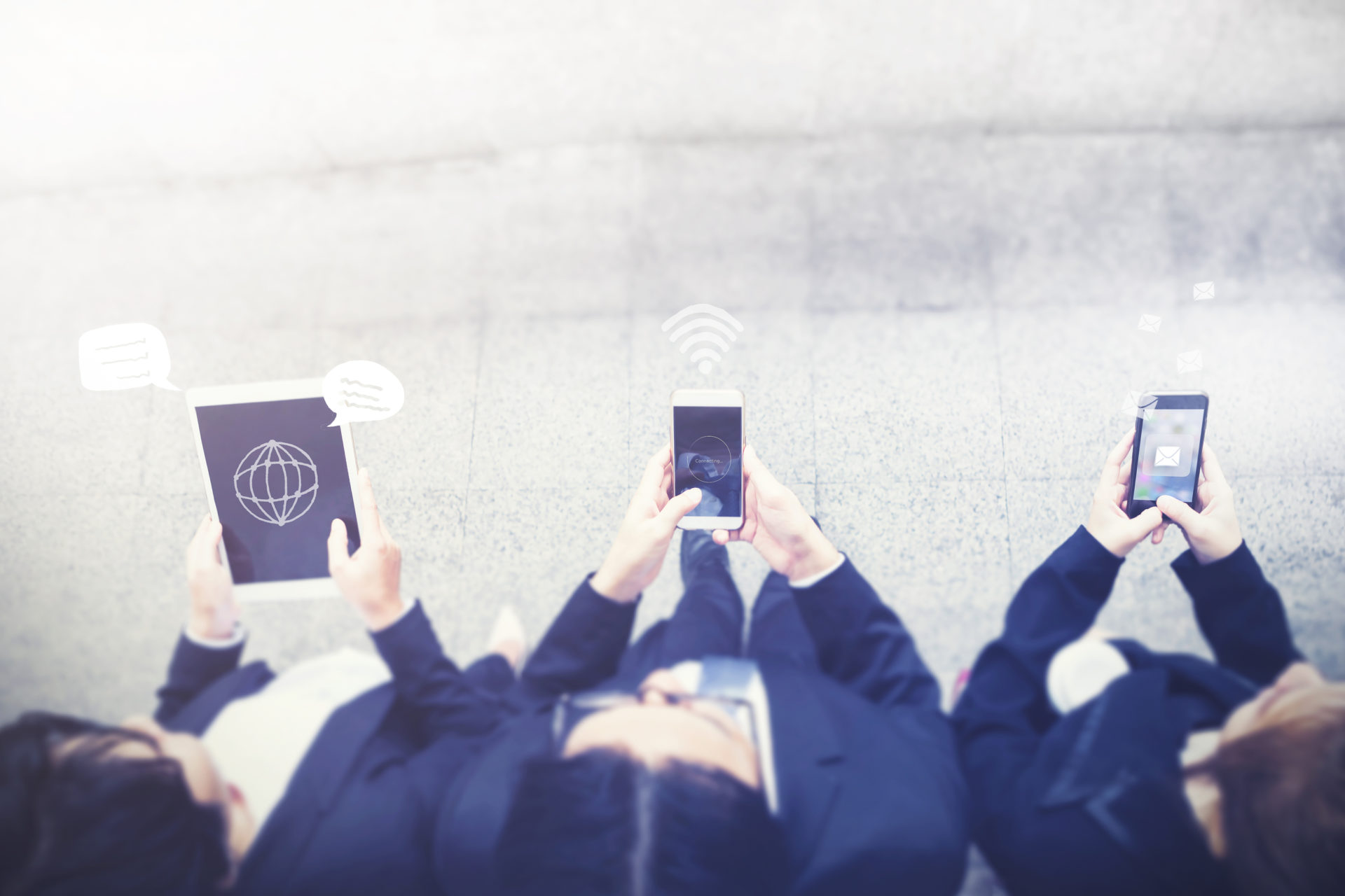 Business people using mobile and tablet with technology icons on